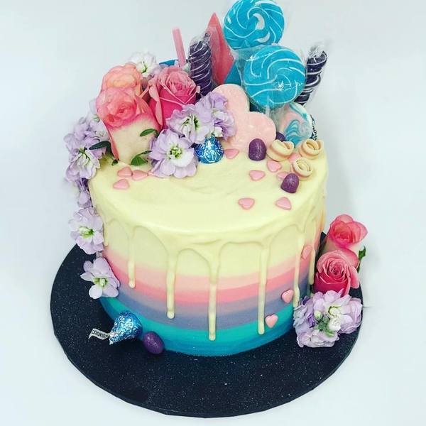 Ombre Blue, Purple, Pink & Cream Drip Cake With Overload Toppings and Fresh Flowers