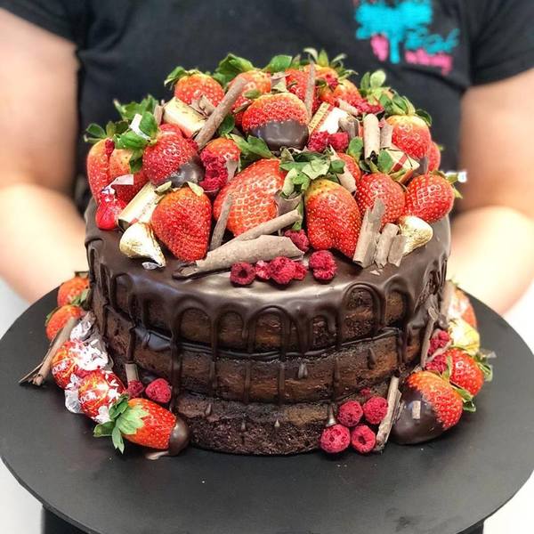 Uniced Chocolate Cake with Ganache Drip and Fresh Fruit