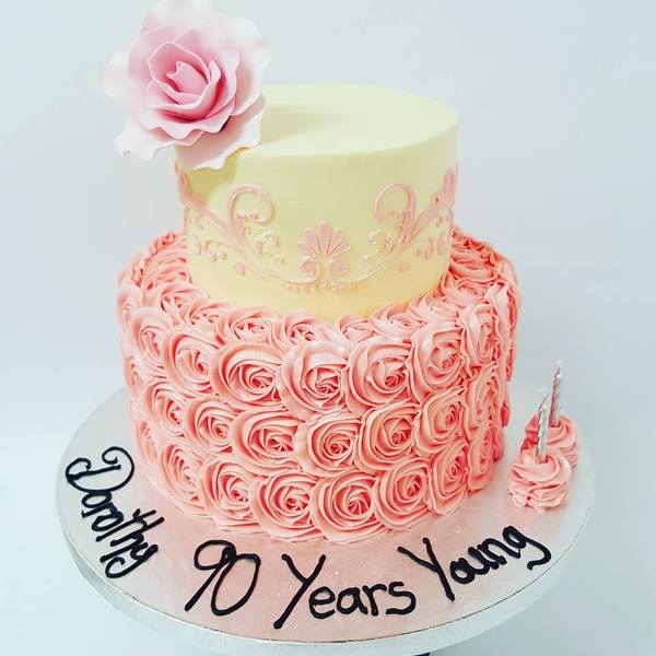 Two Tier Pink and Cream Cake with Roses and Stencil