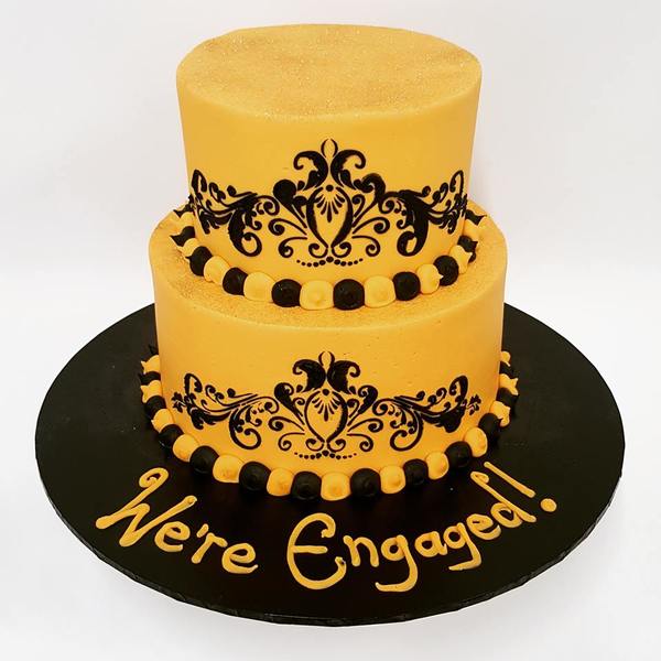 Two Tier Gold and Black Stencil Cake