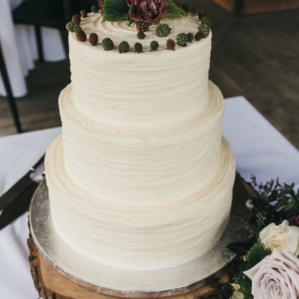 Three Tier Cream Ribbed Wedding Cake
