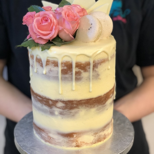 Cream Naked Cake With White Chocolate Drip, Fresh Flowers and Toppers
