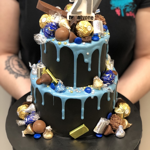 Two Tier Smooth Black With Blue Drip and Chocolate Toppers 
