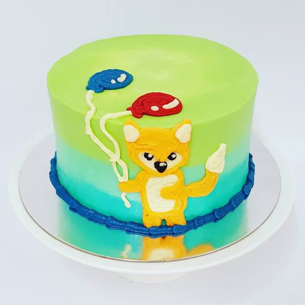 Smooth Cake with Piped Fox and Balloons