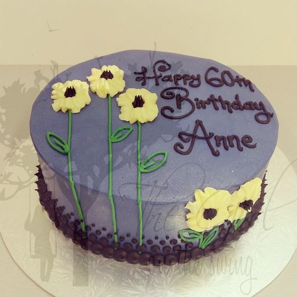 Smooth Blue Cake with Piped Flowers