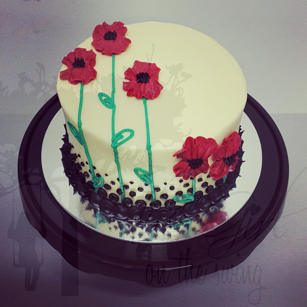 Smooth White Cake with Piped Poppies