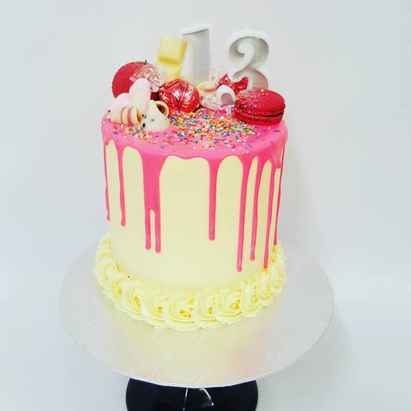 Smooth Cream with Bright Pink Drip and Bright Toppings