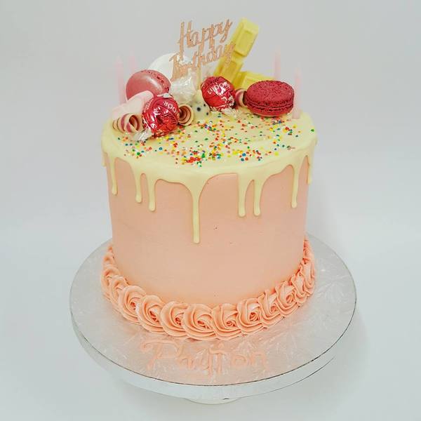 Smooth Light Pink with White Chocolate Drip and Toppings