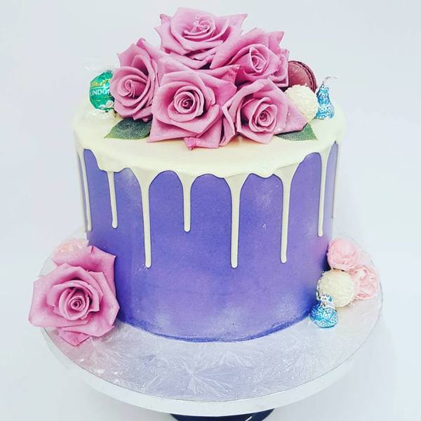 Smooth Purple Drip Cake with Fresh Flowers