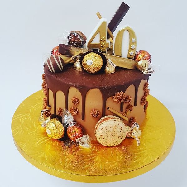 Smooth Chocolate and Gold Overload Cake