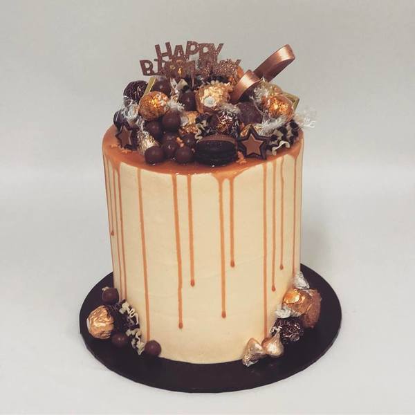 Tall Smooth Cream with Caramel Drip and Chocolate Toppings