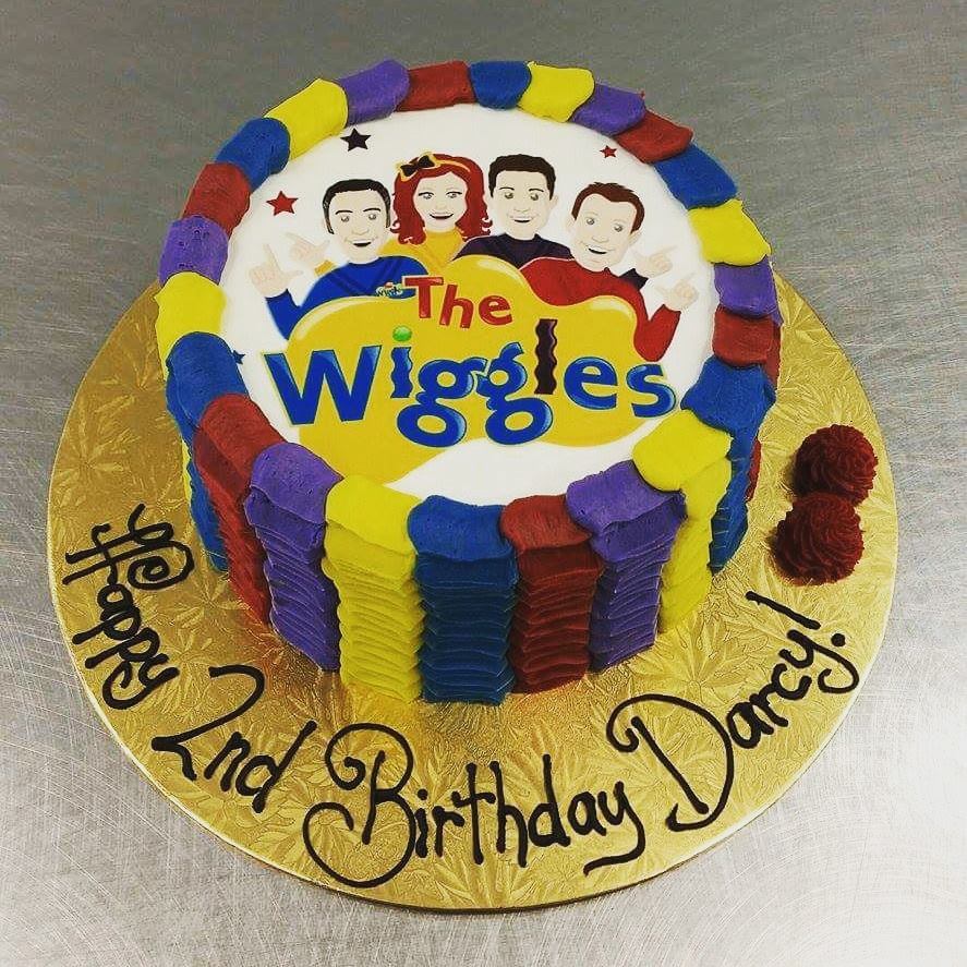 Multi Coloured Ruffle Wiggles Cake (with edible image) - The Girl on ...